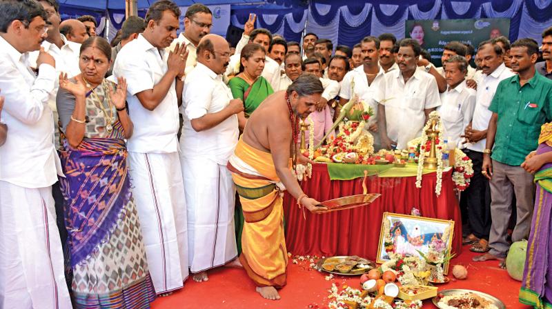 Priest performs a special puja to mark the inaugural of Villivakkam lake restoration work.  Ministers S. P. Velumani, D. Jayakumar and corporation commissioner Dr D. Karthikeyan take part in the event. (Photo:DC)