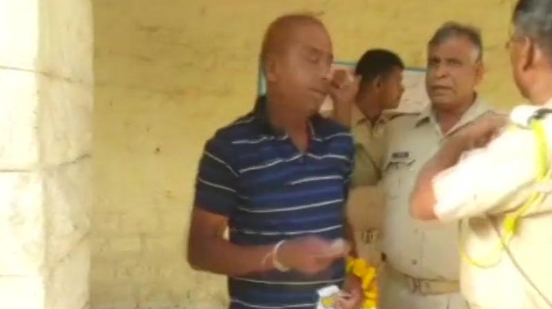 The follower managed to reach the jail despite the high-security arrangements made in Jodhpur. (Photo: ANI)