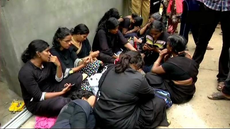 Repeated talks by the police with the women who were sitting on the road for over six hours, also failed as they insisted on climbing the hill and have darshan at the shrine. (Photo: ANI)