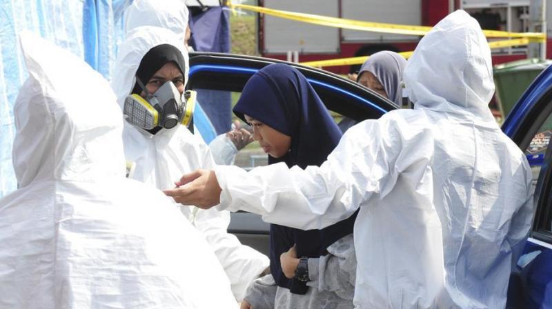 Schools closed in Malaysia after toxic fumes lead to several falling ill
