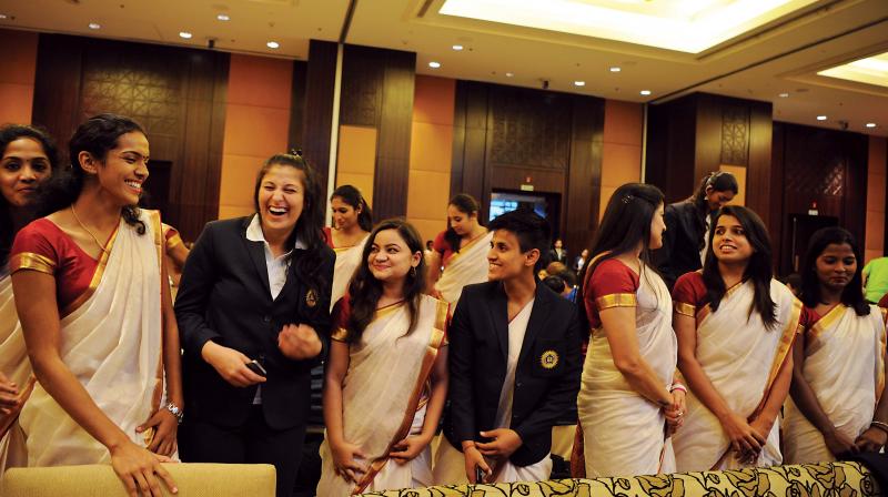 Indian team share a light moment during the inaugration of the FIBA Womens Asia Cup 2017 on Saturday. (Photo: R. SAMUEL)