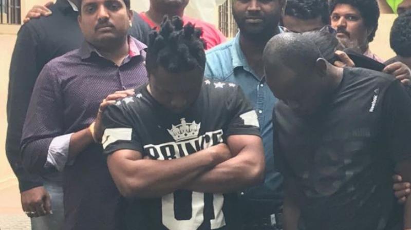 9 people, including 2 Nigerian nationals, held by police with 300 grams of cocaine and 42 grams of MDMA (a psychoactive drug). (Photo: Twitter | ANI)