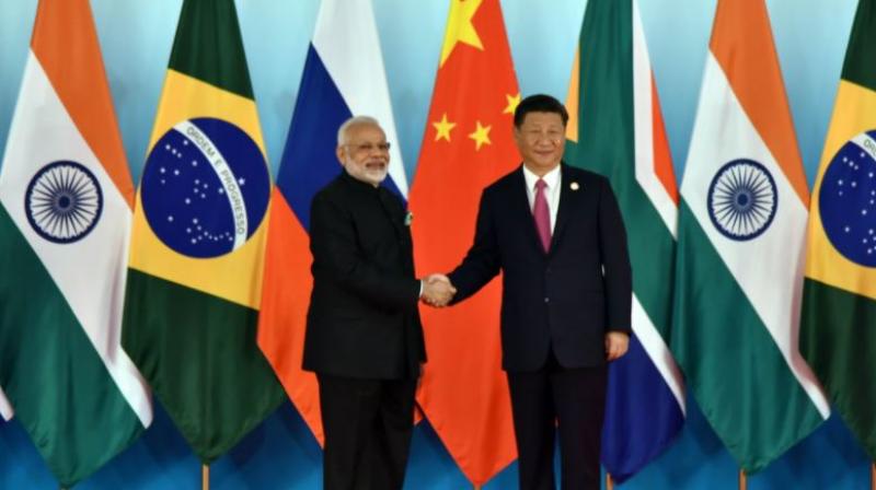 Chinese President Xi Jinping welcomed Indian Prime Minister Narendra Modi, other BRICS leaders at the  International Conference Centre in Xiamen. (Photo: Twitter | @MEAIndia)