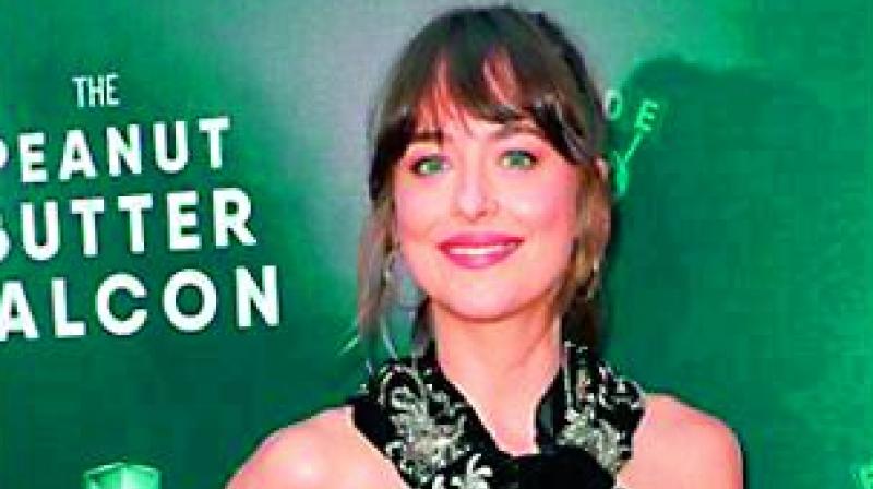 Dakota Johnson was recently spotted without the gap in her front teeth.