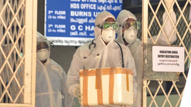 Samples of Nipah suspects being taken for test at Pune National Virology Institute from Ernakulam Government Medical College on Tuesday. (Photo: SUNOJ NINAN MATHEW)