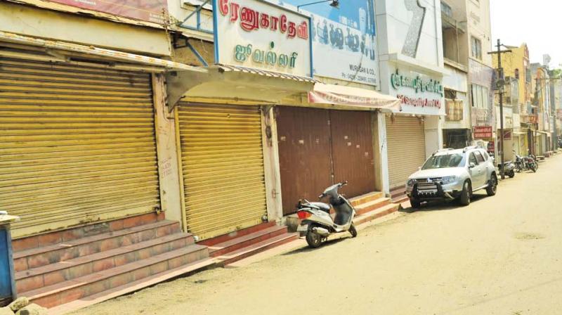 Traders demanding fair probe down shutters in Pollachi