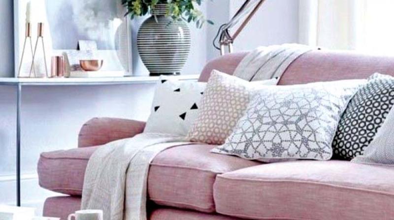 Quirk up your living room with millennial pink upholstery.