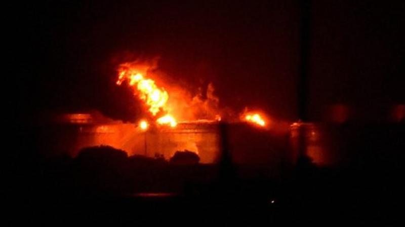 Fire breaks out at a oil depot on Butcher Island off the coast of Mumbai on Friday. (Photo: PTI)