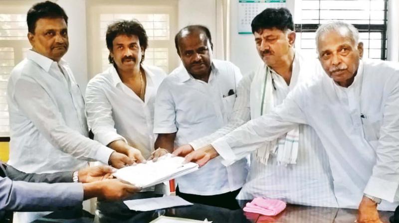 Massive show by coalition workers in Shivamogga as Madhu files papers