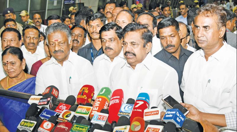 Chief Minister Edappadi K. Palaniswami interacts with media at airport while  leaving for Salem. Dy CM O. Panneerselvam and ministers also present. (Photo: DC)