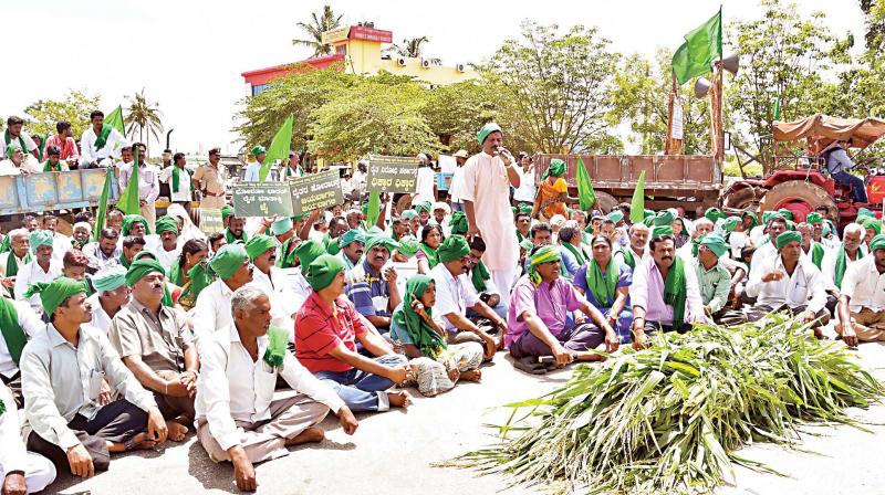 Farmers protest move to amend land acquisition Act, block highways