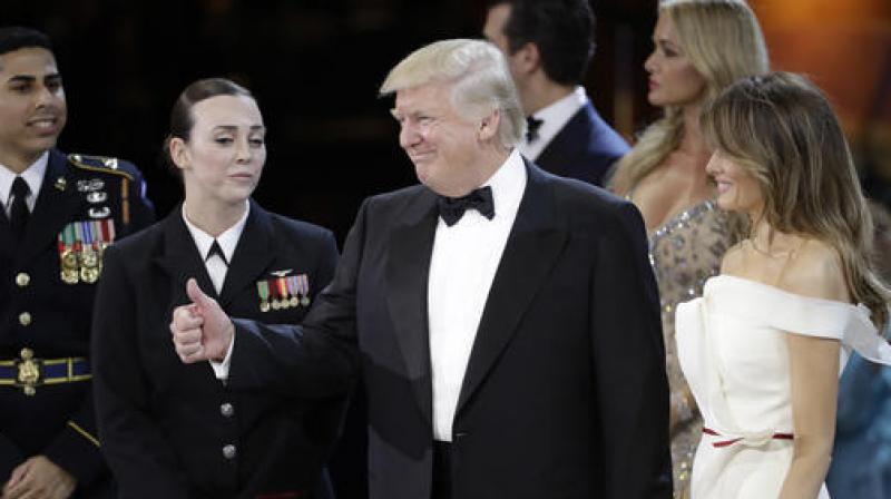 President Donald J. Trump gives a thumbs up after dancing with first lady Melania Trump at The Salute To Our Armed Services Inaugural Ball. (Photo: AP)