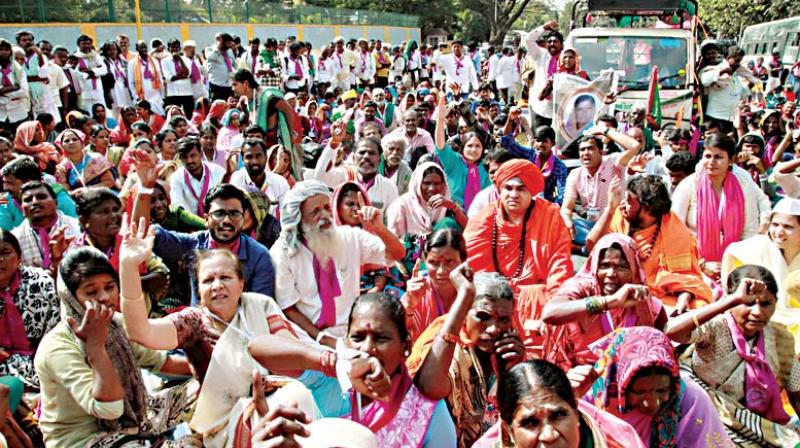 Thousands of women from Madya Nishedha Andolana Karnataka, who walked over 200 km from Chitradurga to Bengaluru to demand immediate ban on liquor, in Bengaluru on Wednesday	KPN