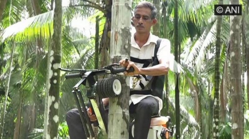 The farmers in the area are taking a keen interest in knowing about the ingenious tree climbing bike developed by Ganapathi and are visiting his house here in Sajeepamuda in Bantwal taluk to inquire about it. (Photo: ANI)