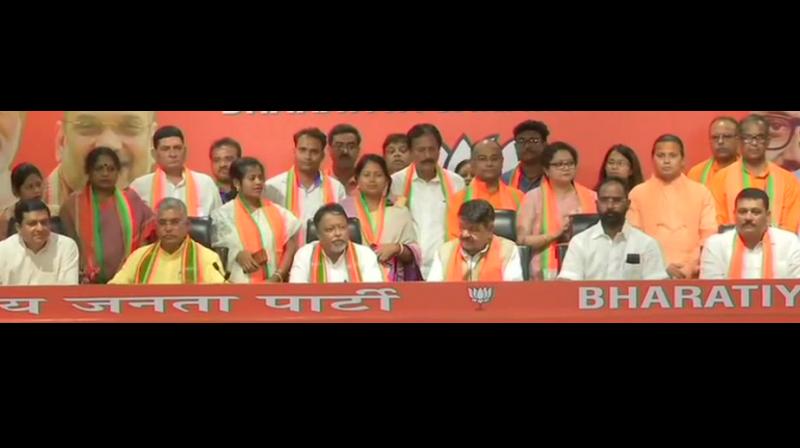 1 TMC MLA, 12 councillors join BJP