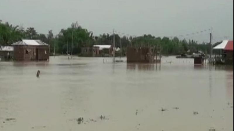 Heavy rains leading to flash flood have left hundreds of houses submerged in North Tripura, Unakoti and Dhalai districts of Tripura. (Photo: Twitter/ ANI)