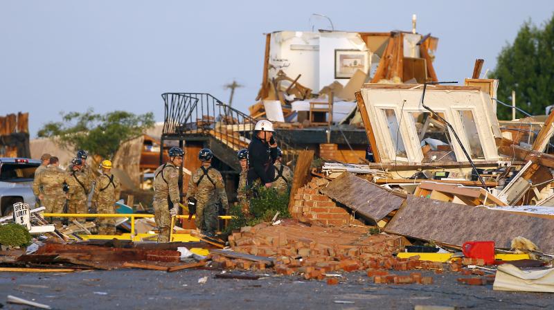 Tornadoes hit 2 Oklahoma cities killing 2, injuring 29; see images