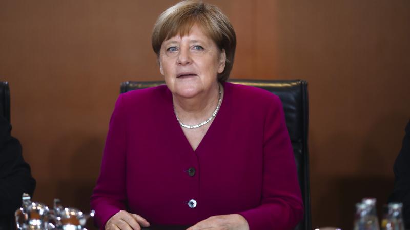 State vote in Germany could endanger future of Merkel coalition