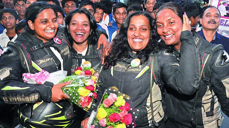 The four members of the womens team, which completed a 17,000-km bike tour of seven nations in seven weeks, share a light moment at a reception  function held at Paryatak Bhavan in the city on Sunday.  (Photo:DC)