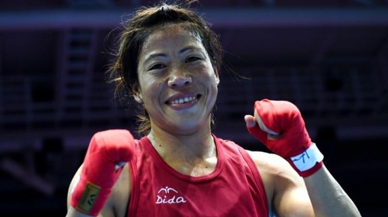 Mary Koms gold at the Asian Boxing Championship is a huge victory for Indias women power. At 34, this mother of 3 has shown that with grit and determination you can overcome seemingly insurmountable odds,\ said Boxing Federation of Indias president Ajay Singh. (Photo: AFP)