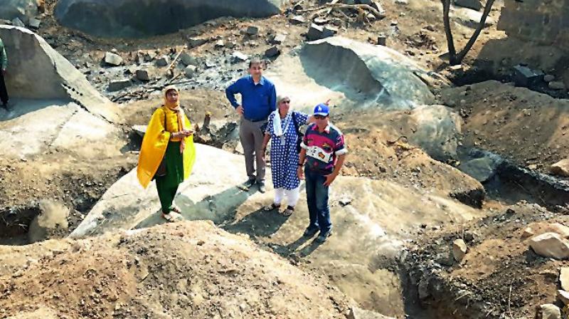 Convenor Intach, Hyderabad Chapter convenor Ms P. Anuradha and others activists inspect the pits.  (Image DC)