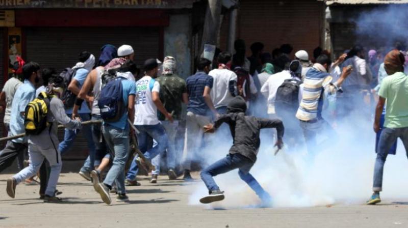 Thousands protest in Kashmir over new status, police use tear gas and pellets