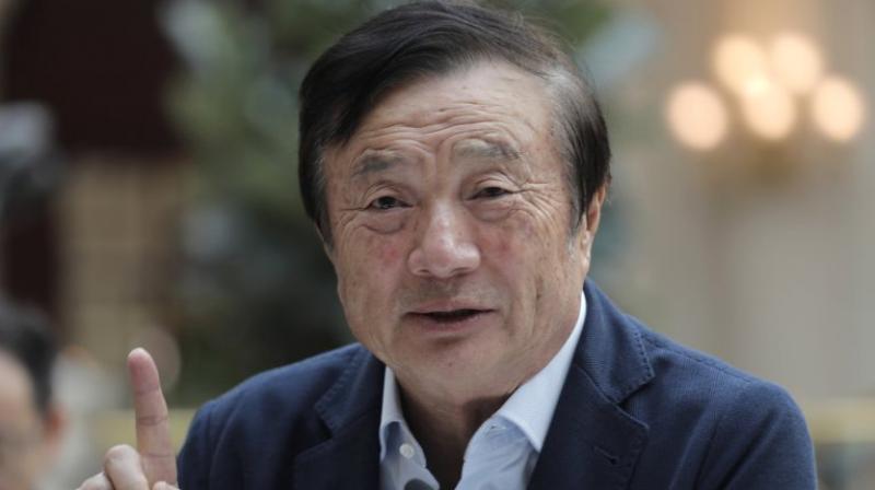 Huawei founder says growth \may slow, but only slightly\