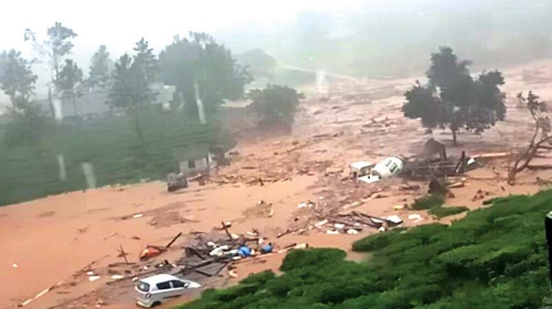 Remains of houses and vehicles that were washed away in landslide in Puthuppadi in Wayanad district (Photo: DC)