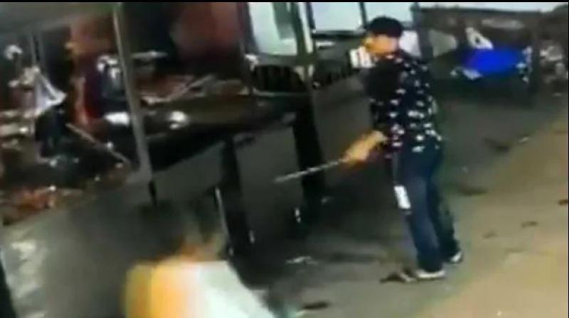 Watch: Delhi man with sword vandalises eateries, threatens shop owners