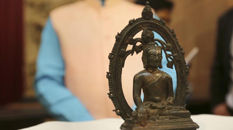 The ancient Buddha statue displayed at the High Commission of India in London Wednesday. (Photo: AP)