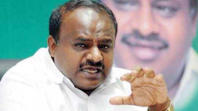 I-T dept seeks legal action against Kumaraswamy, dy CM for intimidating officers