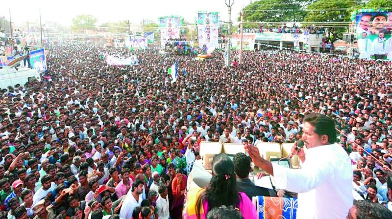 YSRC chief Jagan Mohan Reddy addresses a public meeting at Kaligiri in Udayagiri constituency of Nellore district on Tuesday. (Photo: DC)