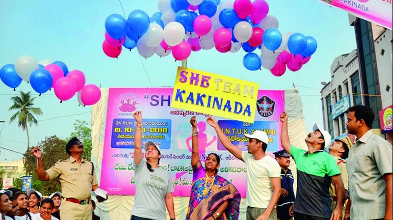 Rural MLA P. Anantha Lakshmi and  East Godavari district SP Vishal Gunni release balloons at the inauguration of  She Teams  in Kakinada on Saturday. (Photo: DC)