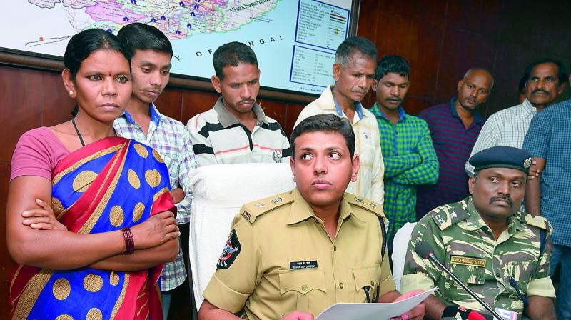 A woman Maoist, carrying a cash reward of 4 lakh on her head, and four armed militia members of the banned CPI (Maoists) surrendered to the police on Saturday citing various reasons, including ill health and harsh treatment from their leaders.