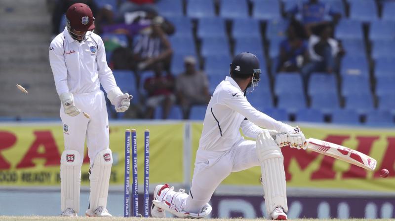 After he was sent back to pavilion with 38 runs score against West Indies on day three of the ongoing first Test, batsman KL Rahul on Sunday said that he was very disappointed adding that he needs to be patient in order to improve his game. (Photo:AP)