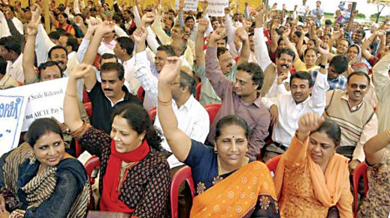 A file photo of teachers of unaided engineering colleges staging a protest seeking better deal.