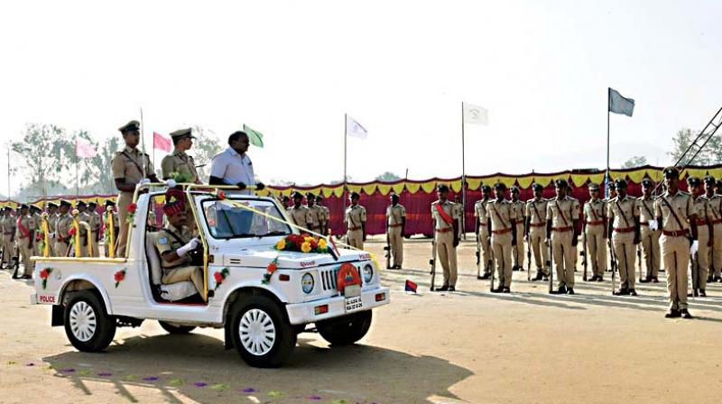 CM H.D. Kumaraswamy reviews the passing out parade of 41st batch Deputy Inspector General (Civil) Practitioners in Mysuru on Monday. (Photo: KPN)