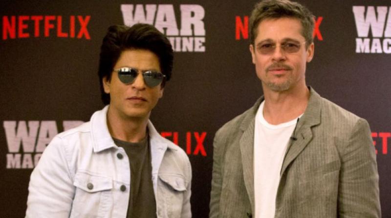 Shah Rukh Khan with Brad Pitt in Mumbai on Wednesday.
