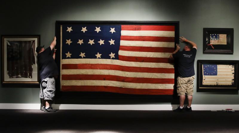 A highlight of the display is a nearly 6-foot (1.8-meter) flag that features 13 stars that roughly form the letters  Uâ€³ and  S.  (Photo: AP)