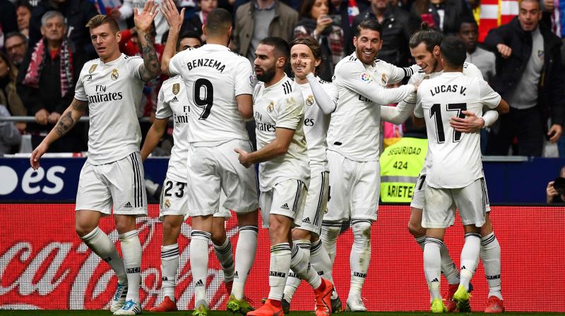 Bales 100th goal for Madrid ended Atleticos hopes of a comeback after Sergio Ramos penalty put Real in front at half-time, with Antoine Griezmann earlier cancelling out Casemiros acrobatic opener. (Photo: AFP)
