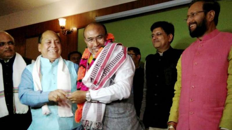 Nongthombam Biren Singh is greeted after he was elected at BJP legislature party leader in Imphal. (Photo: PTI)