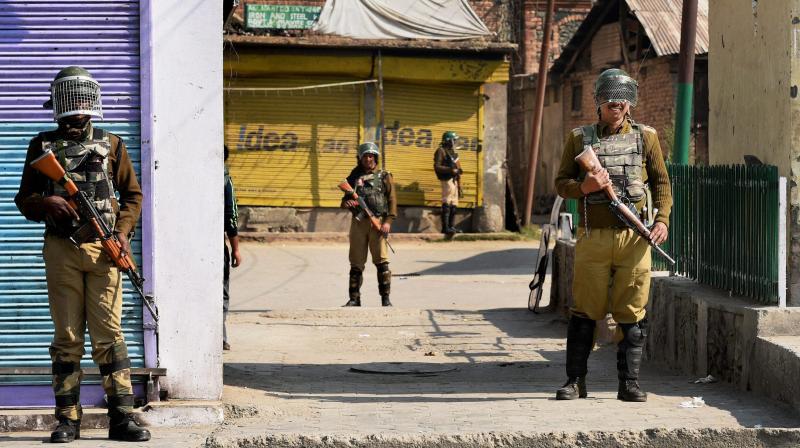 Security jawans stand guard in Jammu and Kashmir. (Photo: PTI)