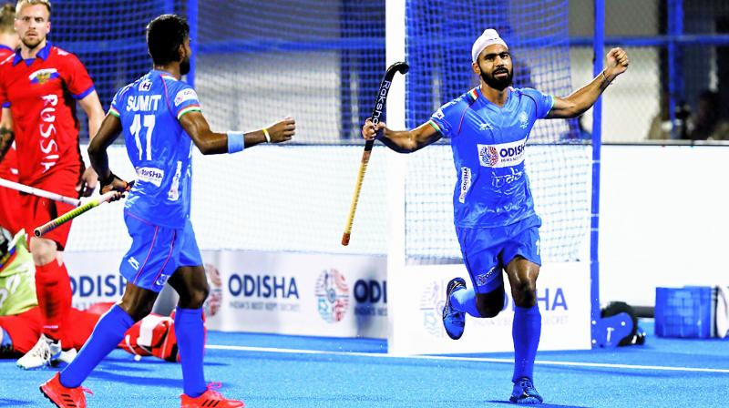 Hockey India tweeted this photo of Simranjeet Singh (right) celebrating after scoring for India against Russia in the mens FIH Series Finals in Bhubaneswar on Thursday.