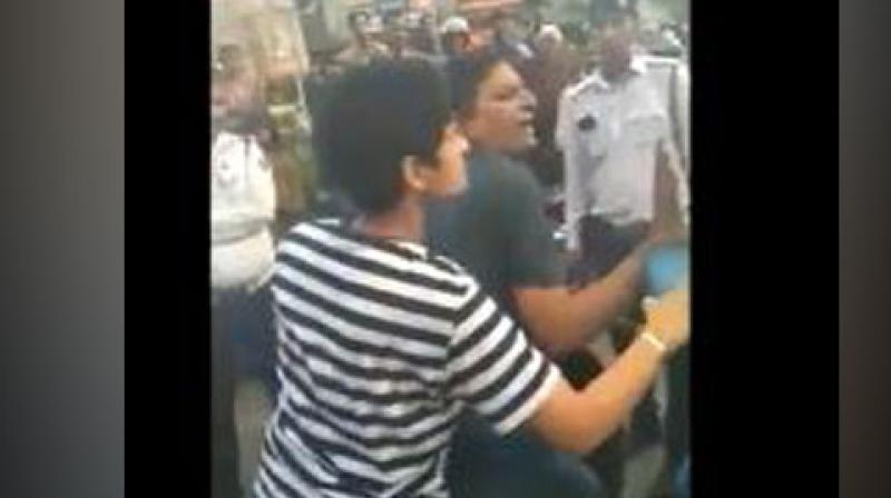 Watch: Stopped for riding without helmet, Delhi woman clashes with cop; arrested