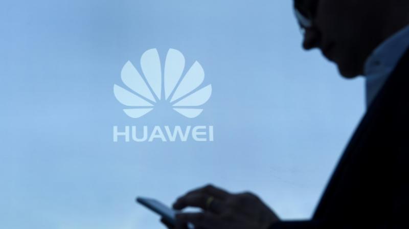 Huaweis first mobile digital assistant, Kirin 970, will systematically respond to three questions: Where is the user? Who are they and what are they doing? (Photo: AFP)
