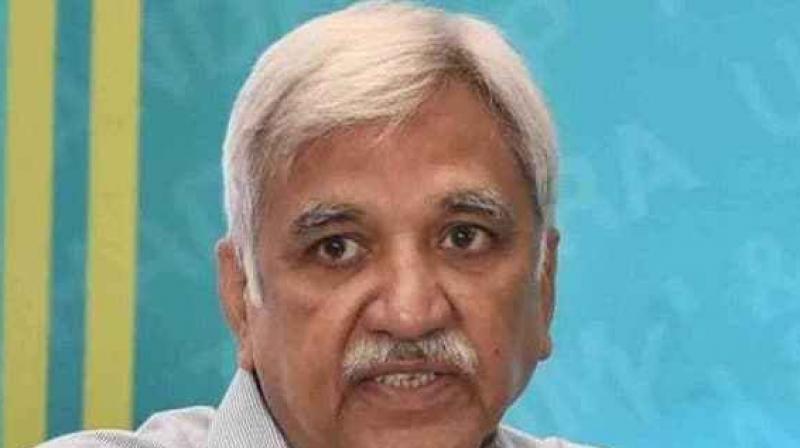 Sunil Arora said \It is my request to all, please do not make EVMs a football\. (File)