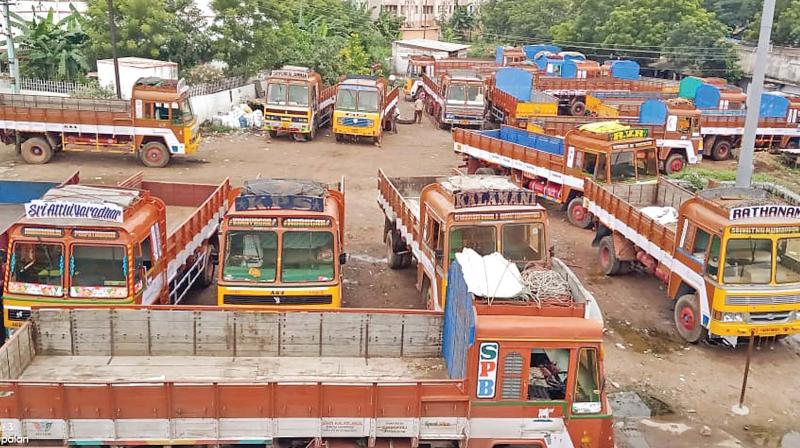 Trucks parked hapazardly at a parking bay in Salem as lorry owners went on a day strike. (Photo: DC)