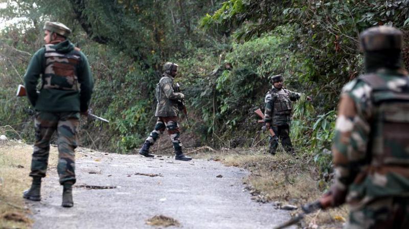 Indian army soldiers take position during an encounter with militants in Jammu and Kashmir. (AFP/File)