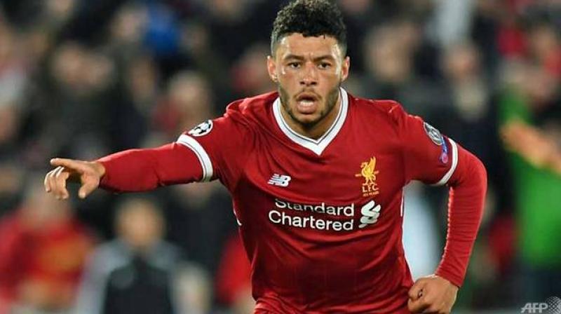 Midfielder Alex Oxlade-Chamberlain has signed a new long-term contract at Liverpool, the Premier League club have said. (Photo:AFP)