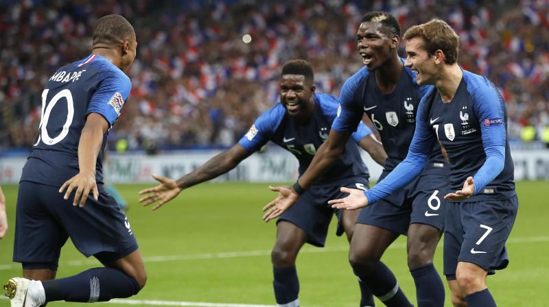 The result gives France six points from their first two matches and puts them ahead Turkey, who also won 4-0 on Monday, on goal difference. (Photo:
